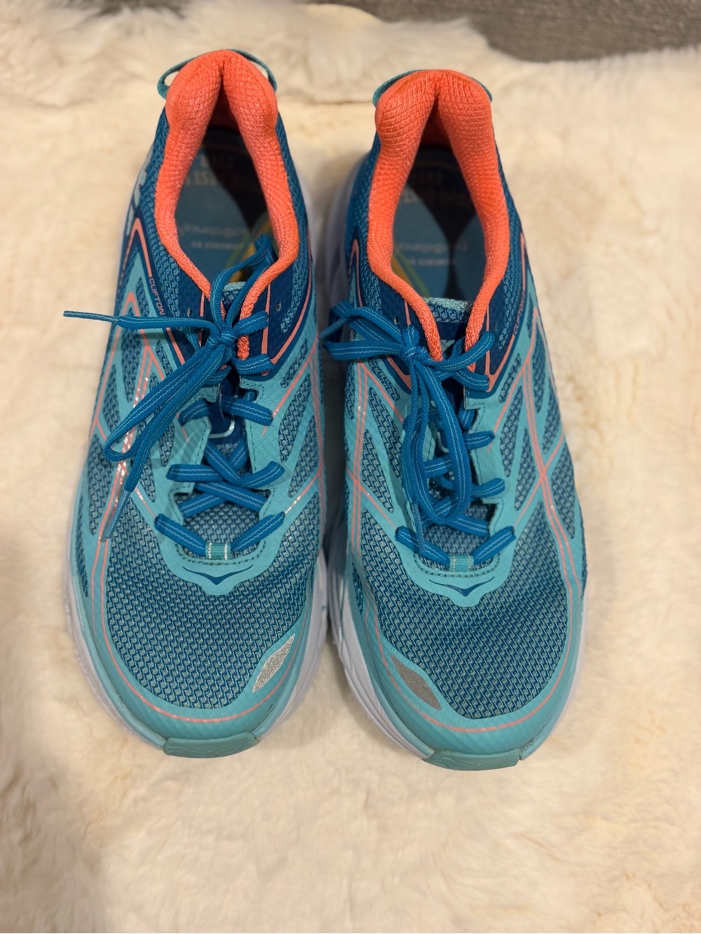 Hoka One One men’s Running Shoes in Teal and Coral